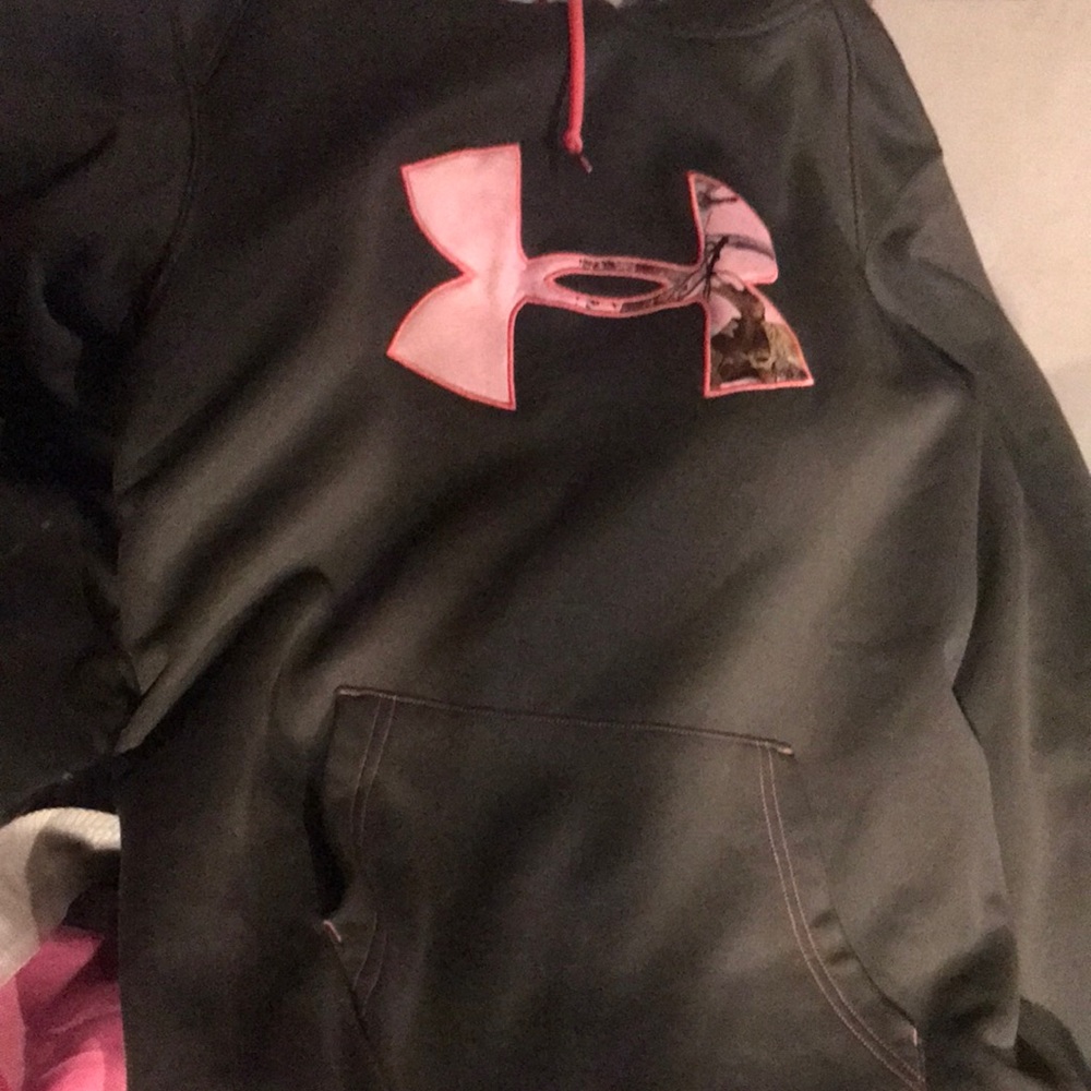 Under armor hoodie with pink camo on the under armor symbol